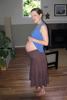 A picture of Leanne with her belly showing